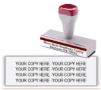Shown here is a Trodat Rubber Stamp with a traditional handle. This Rubber Stamp holds four lines.