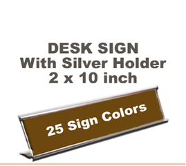 Shown here is a 2X10 Engraved Sign including a Silver slide in Desk holder.