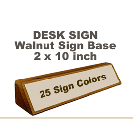 Shown here is a 2X10 Engraved Sign including a hand rubbed Walnut Desk holder.