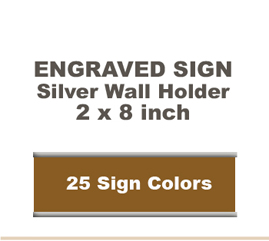 Shown here is a 2x8 Engraved Sign including a Silver slide in wall holder.