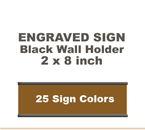 Shown here is a 2x8 Engraved Sign including a Black slide in wall holder.